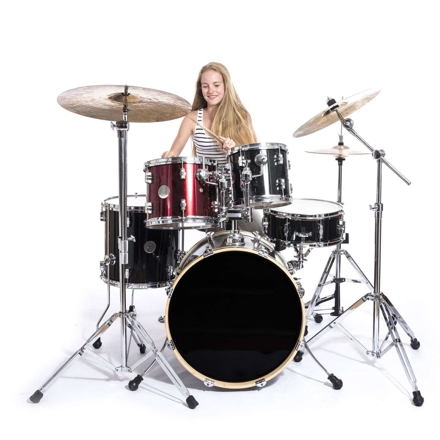 young girl playing the drums